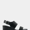 Comfortable Women's Buckle Back Mid Wedge Sandal in Black Faux Leather