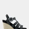 Comfortable Women's Caged Footbed Wedge Sandal in Black Faux Leather
