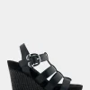 Comfortable Women's Caged Footbed Wedge Sandal in Black Faux Leather