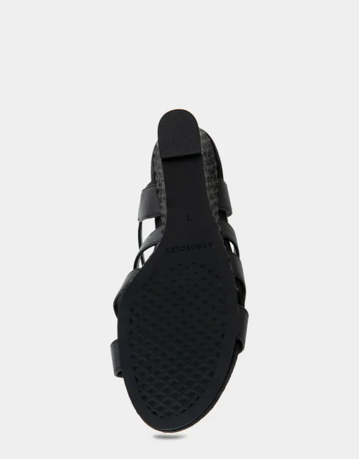 Comfortable Women's Caged Footbed Wedge Sandal in Black Faux Leather