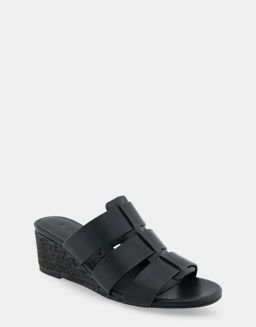 Comfortable Women's Fisherman Mid Wedge Slide in Black Faux Leather