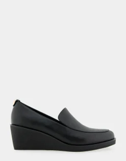 Comfortable Women's Molded Crepe Textured Wedge Loafer in Black Faux Leather