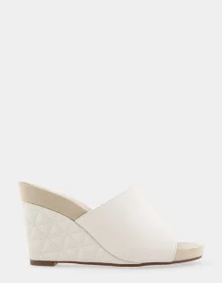 Comfortable Women's Quilted Heel Footbed Wedge Slide in Eggnog Faux Leather