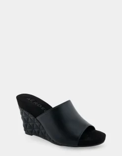 Comfortable Women's Quilted Heel Footbed Wedge Slide in Black Faux Leather