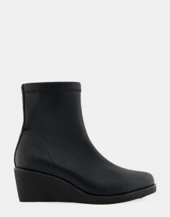 Comfortable Women's Stretch Ankle Crepe Textured Wedge Bootie in Black Stretch Pebbled Faux Leather Faux Leather