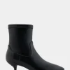 Comfortable Women's Stretch Point Toe Molded Outsole Kitten Heel Bootie in Black Stretch Faux Leather Faux Leather